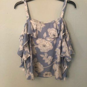 light blue and white floral with shoulder straps and wing sleeves.